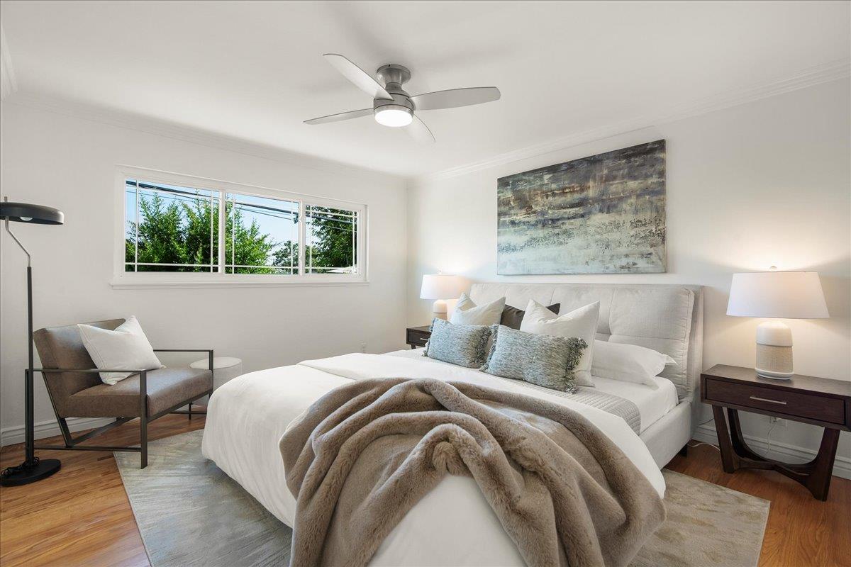 7669 Rainbow Drive Cupertino, CA 95014 - Photo 21 of 37 a bedroom with bed and window