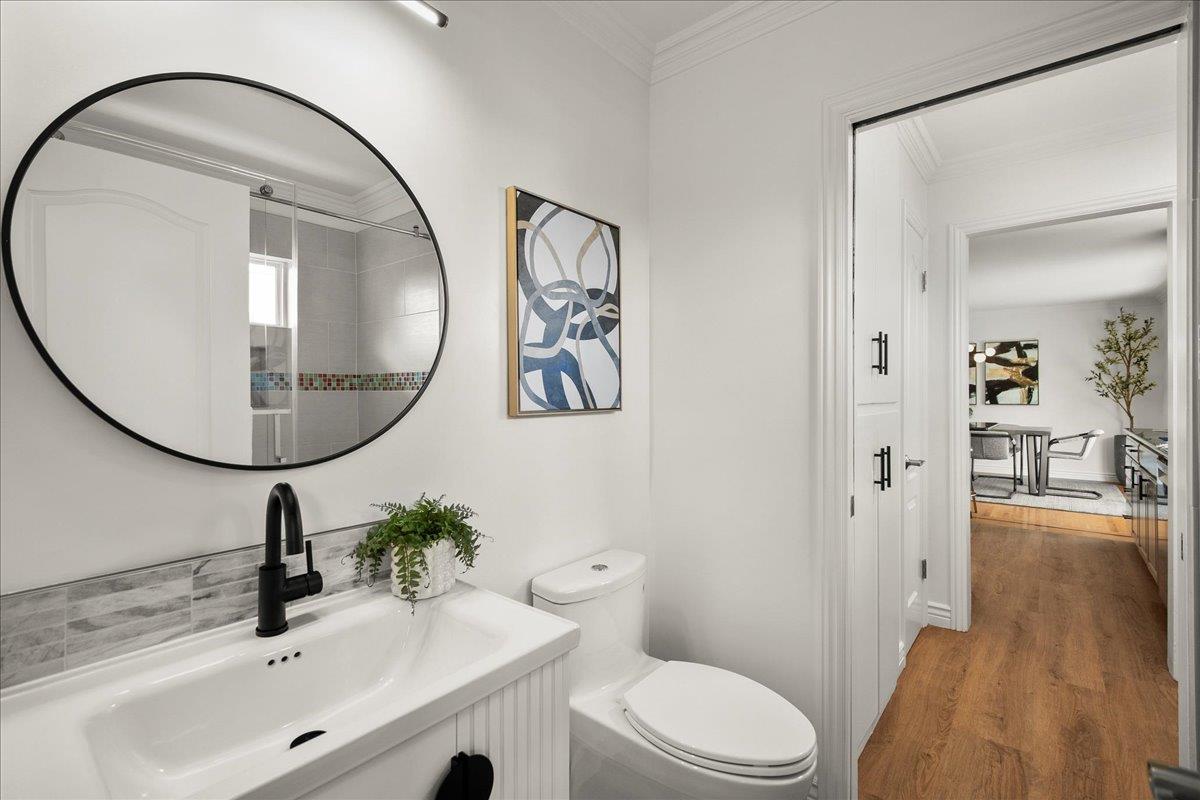 7669 Rainbow Drive Cupertino, CA 95014 - Photo 23 of 37 a bathroom with a sink and a mirror