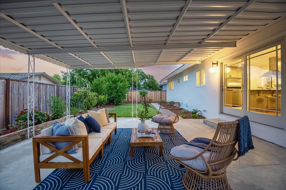 7669 Rainbow Drive Cupertino, CA 95014 - Photo 33 of 37 a backyard of a house with outdoor seating