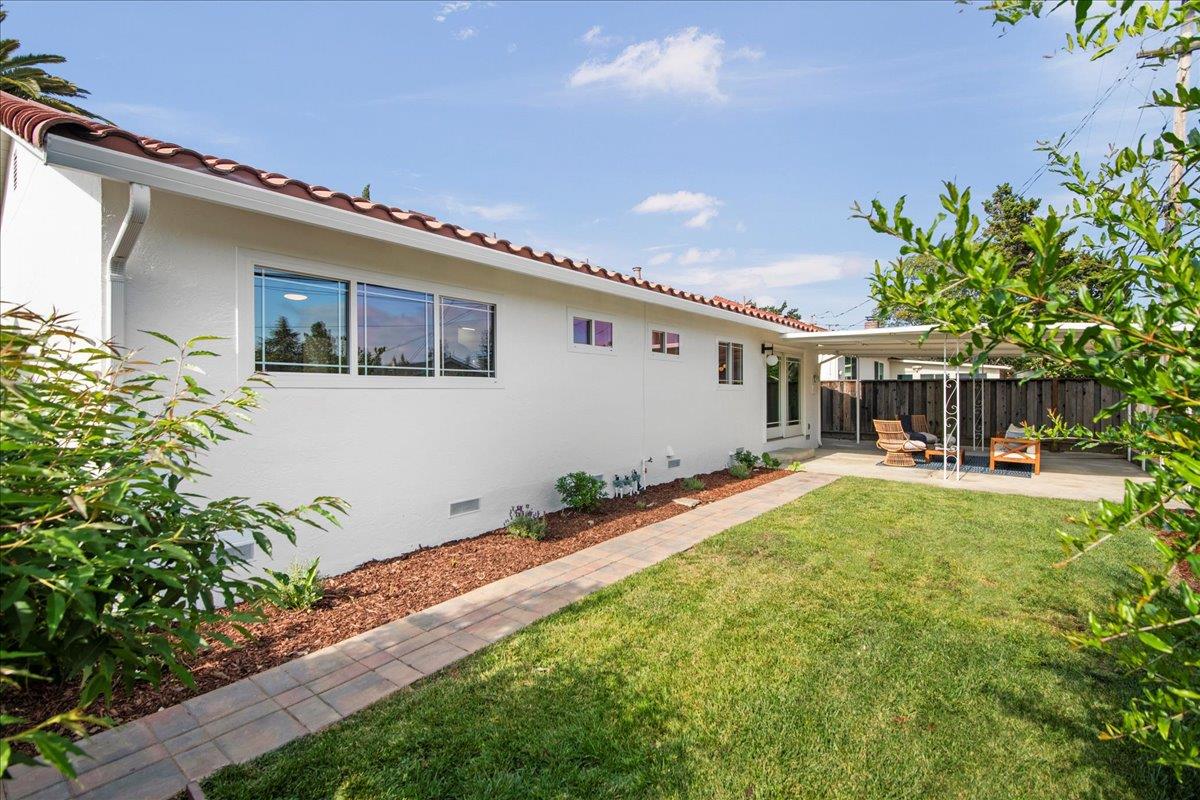 7669 Rainbow Drive Cupertino, CA 95014 - Photo 36 of 37 a front view of house with yard