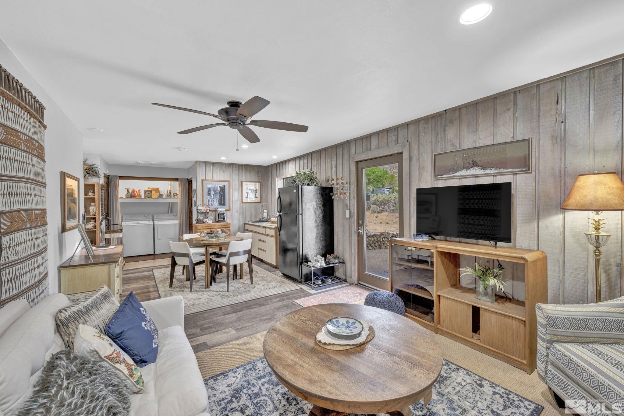 310 Ruby Lane Carson City, NV 89706 - Photo 13 of 40 a living room with furniture and a flat screen tv