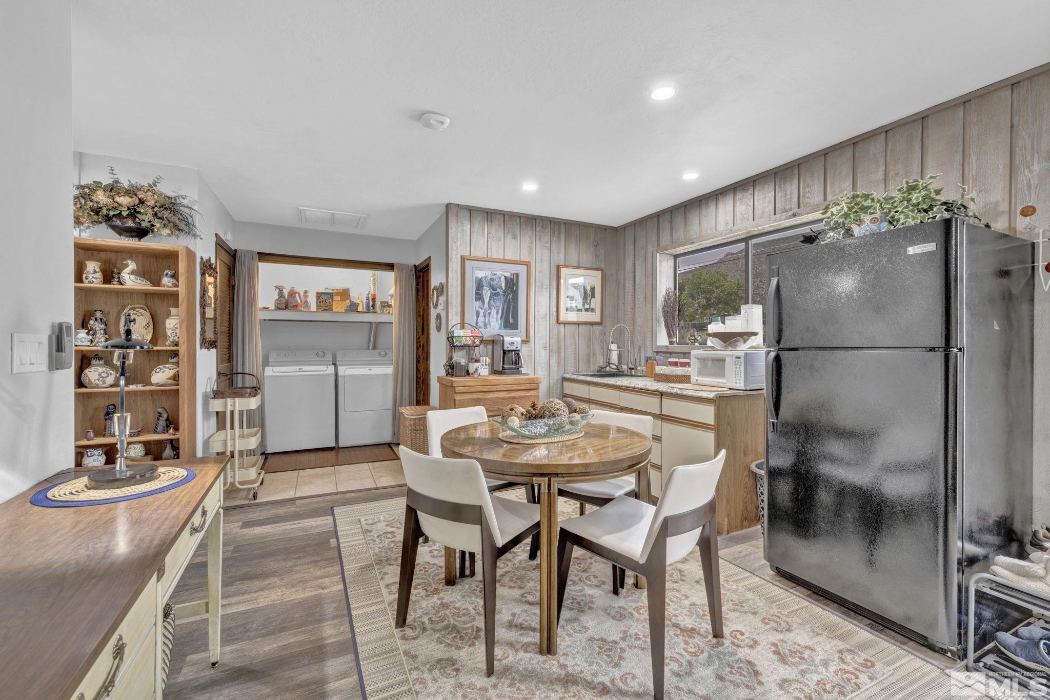 310 Ruby Lane Carson City, NV 89706 - Photo 14 of 40 a kitchen with stainless steel appliances granite countertop a refrigerator and a stove top oven