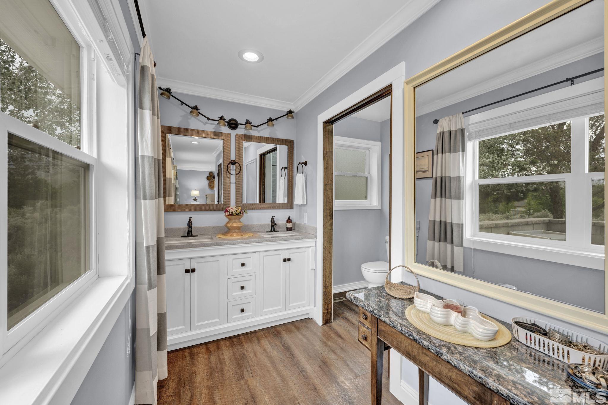 310 Ruby Lane Carson City, NV 89706 - Photo 21 of 40 a bathroom with a granite countertop sink mirror and shower