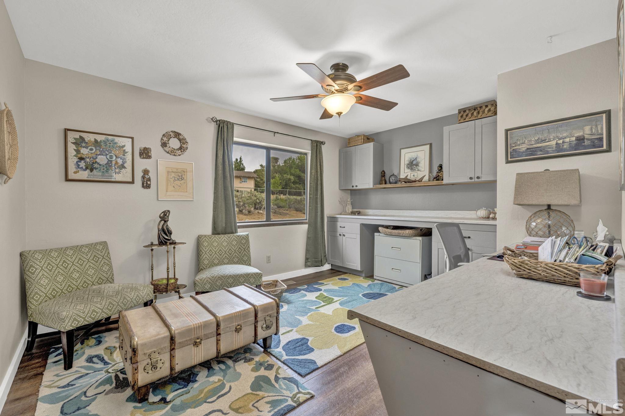310 Ruby Lane Carson City, NV 89706 - Photo 24 of 40 a living room with furniture and a fireplace