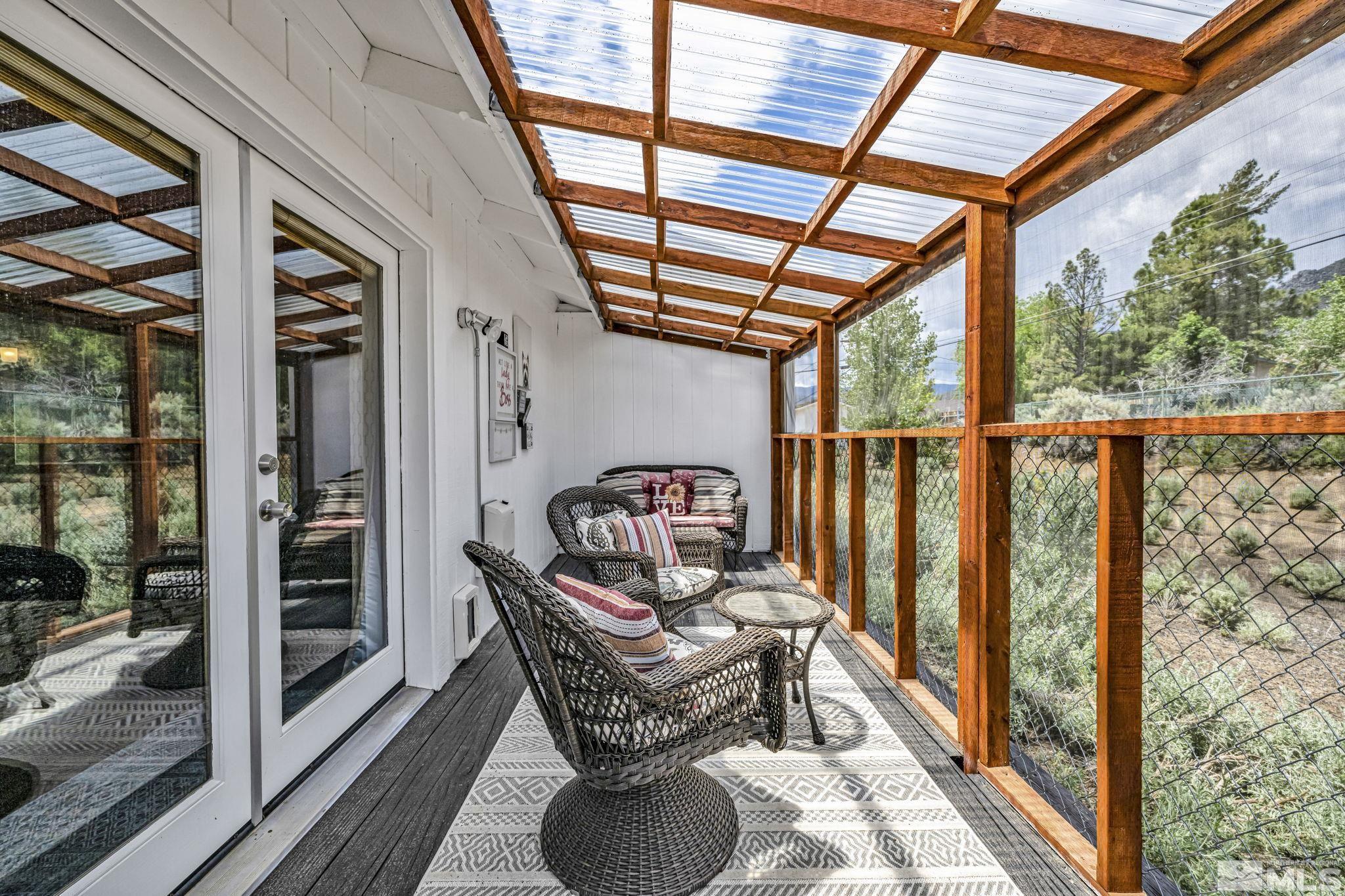 310 Ruby Lane Carson City, NV 89706 - Photo 26 of 40 a view of a porch with furniture