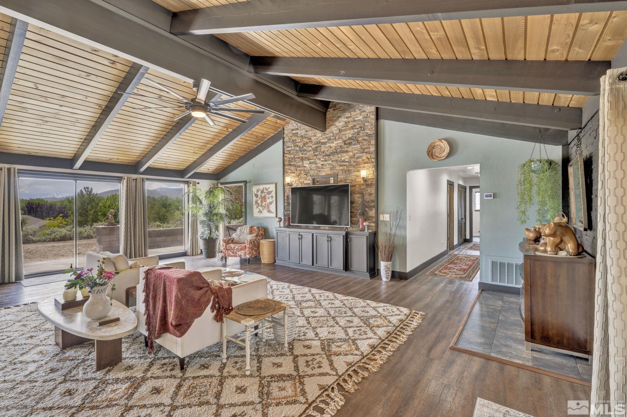 310 Ruby Lane Carson City, NV 89706 - Photo 3 of 40 a living room with furniture and a fireplace