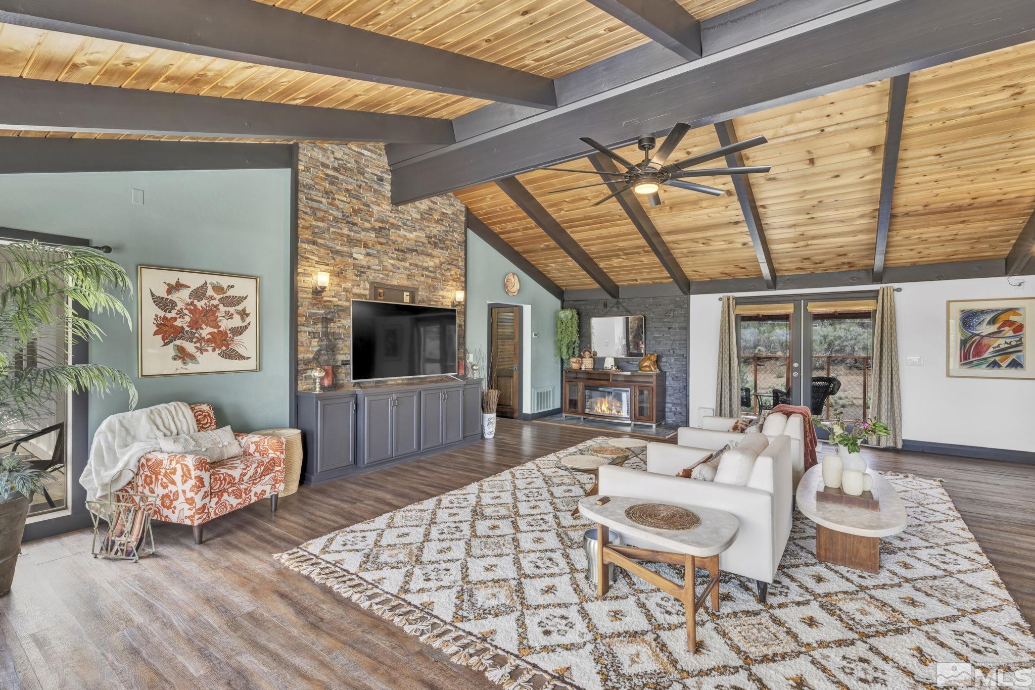 310 Ruby Lane Carson City, NV 89706 - Photo 4 of 40 a living room with furniture and a flat screen tv