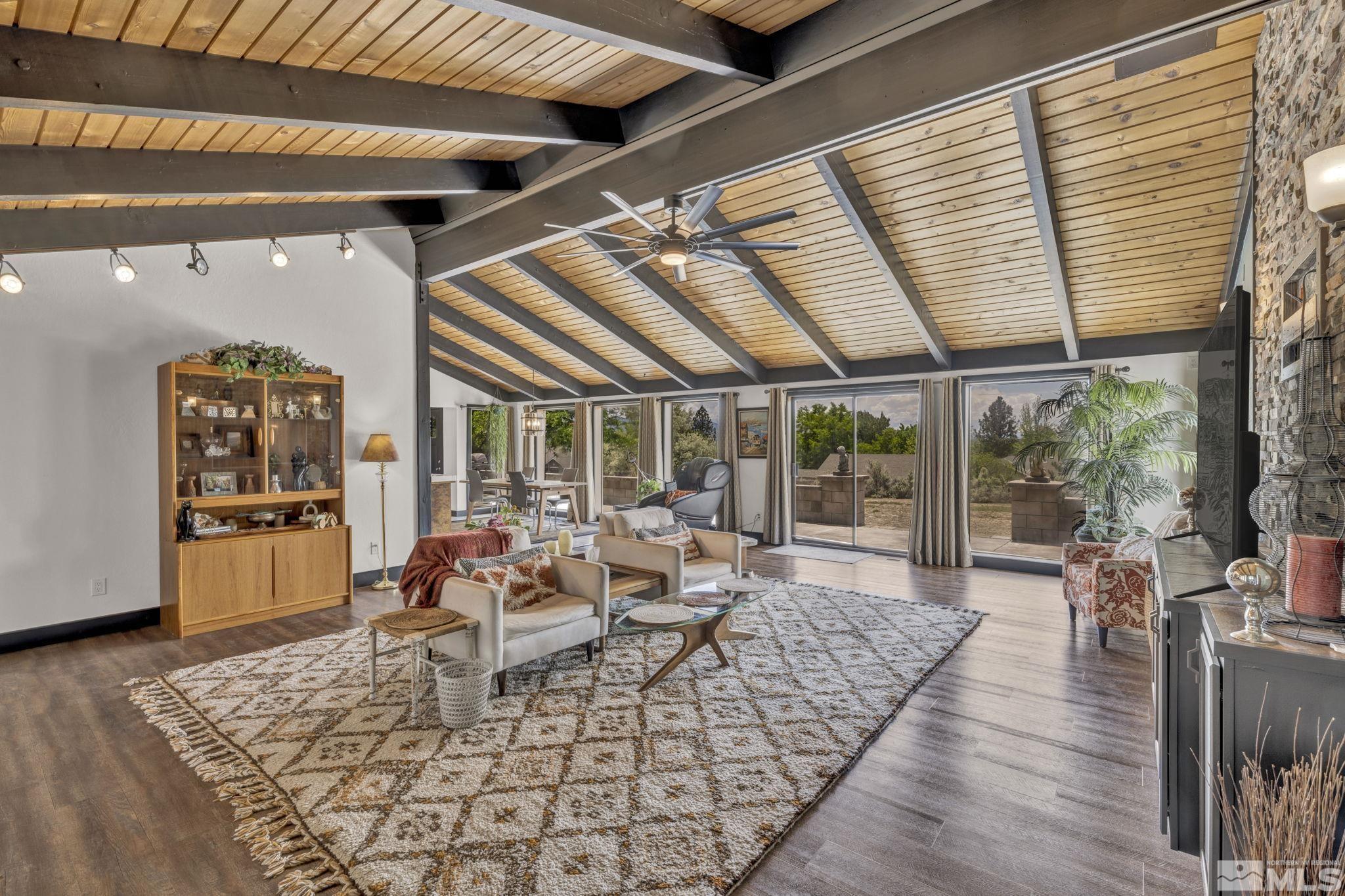 310 Ruby Lane Carson City, NV 89706 - Photo 5 of 40 a living room with furniture and large windows