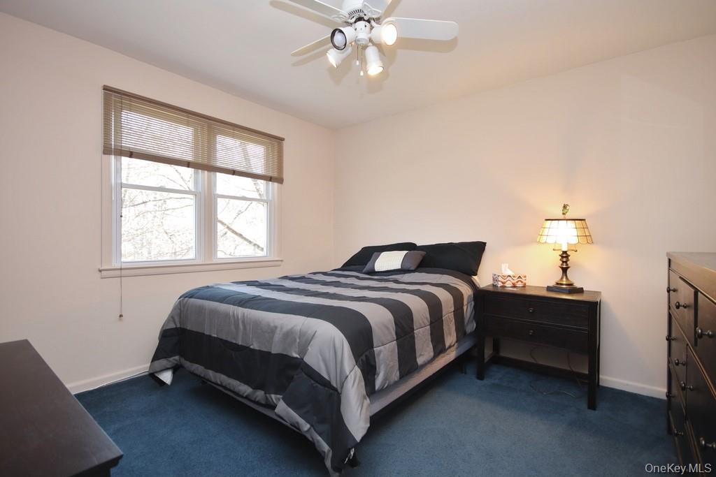47 Fuller Road Briarcliff Manor, NY 10510 - Photo 19 of 34 Third Bedroom has ceiling fan with light
