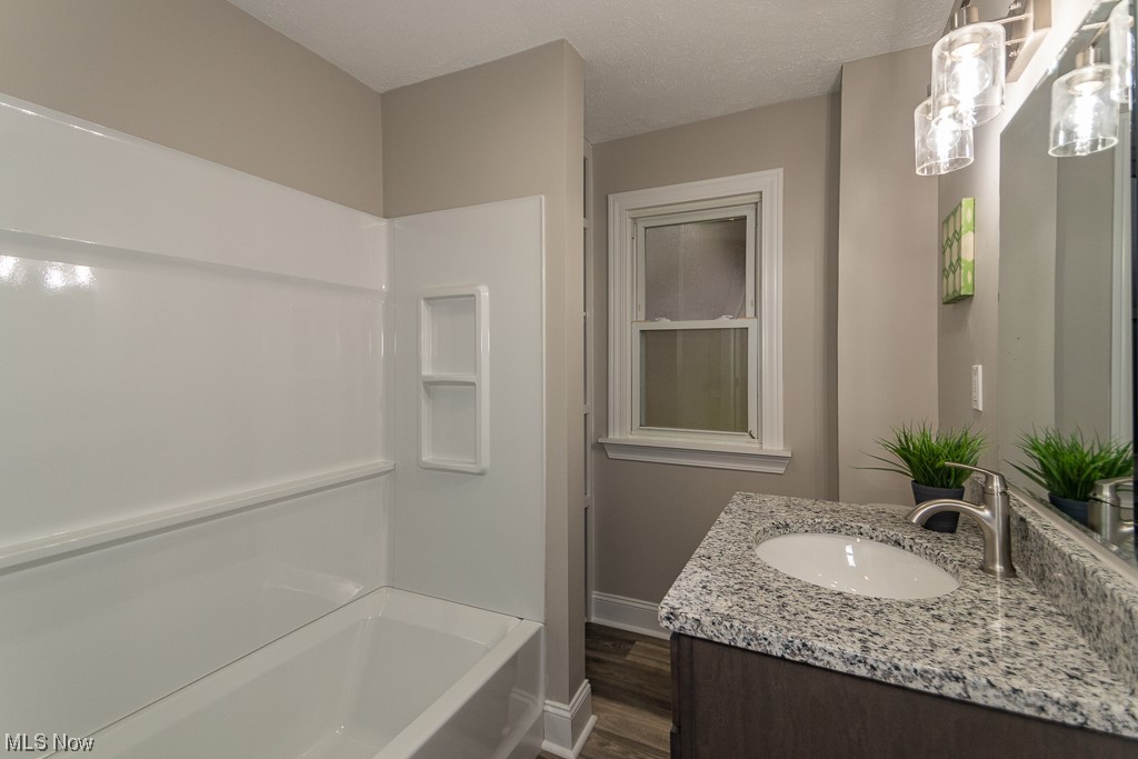 9865 Chillicothe Road Kirtland, OH 44094 - Photo 11 of 36 Main bath nice renovated with luxury vinyl flooring