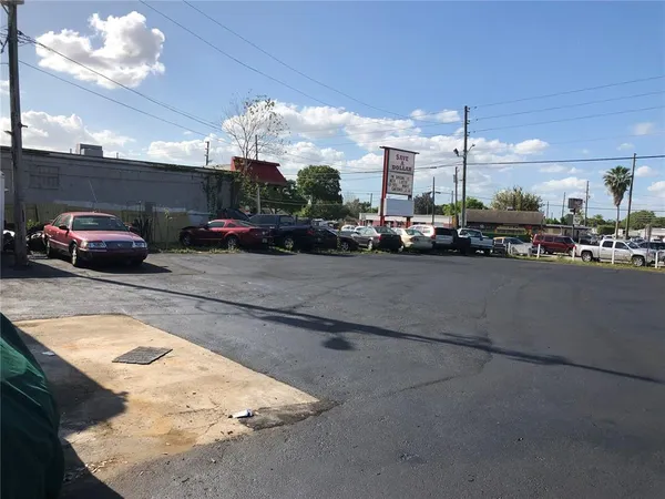 a view of a street with cars