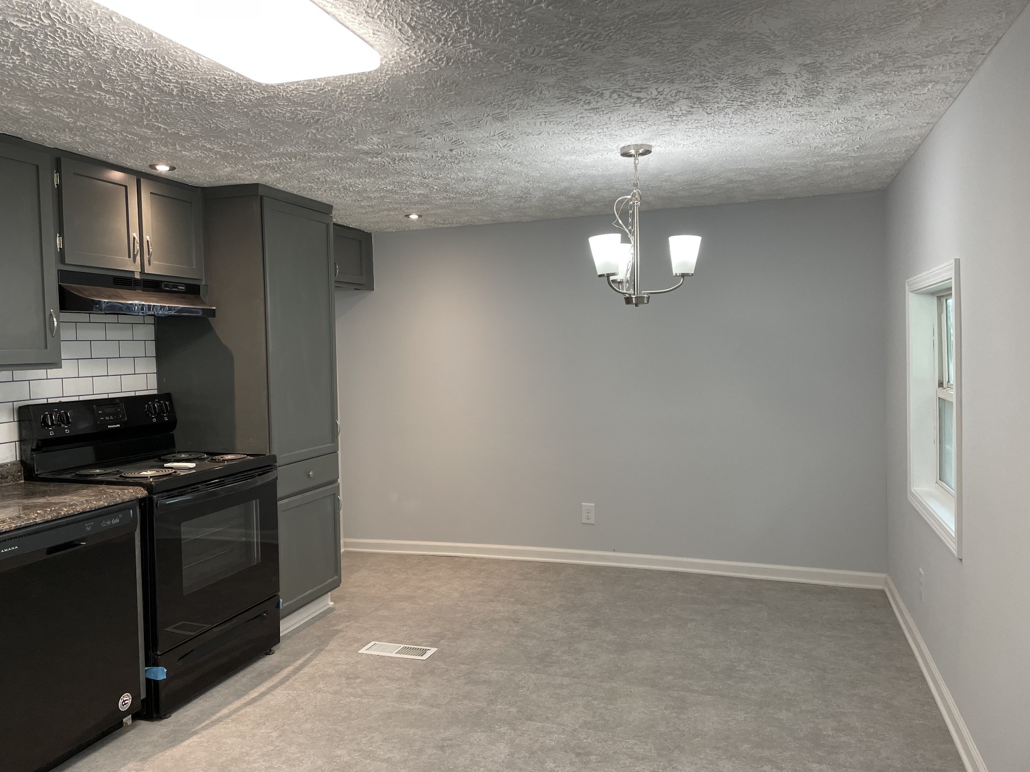 2973 New Bushy Branch Road Manchester, TN 37355 - Photo 2 of 14 a kitchen that has a lot of cabinets in it