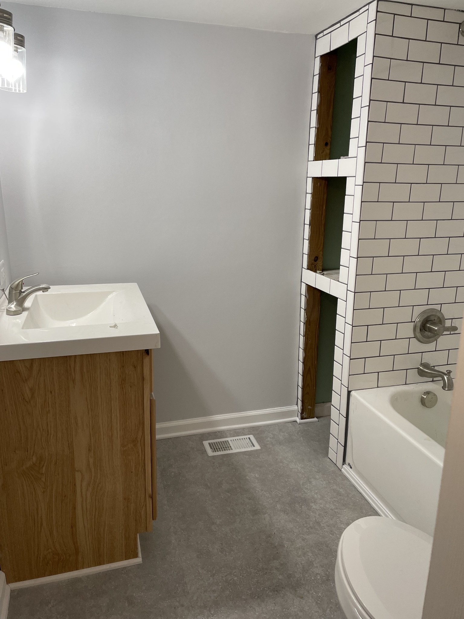 2973 New Bushy Branch Road Manchester, TN 37355 - Photo 9 of 14 a bathroom with a sink toilet and tub