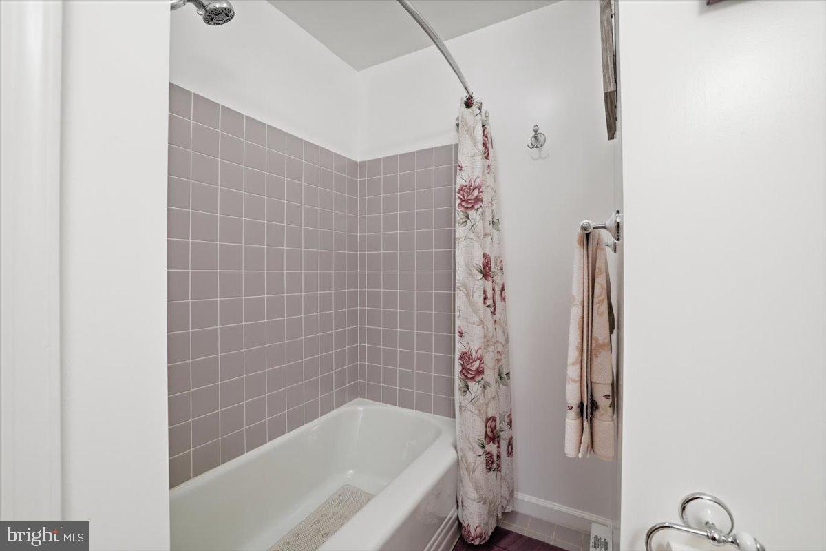 15 Hazard Run Road Lake Harmony, PA 18624 - Photo 16 of 46 a bathroom with a bathtub and a shower