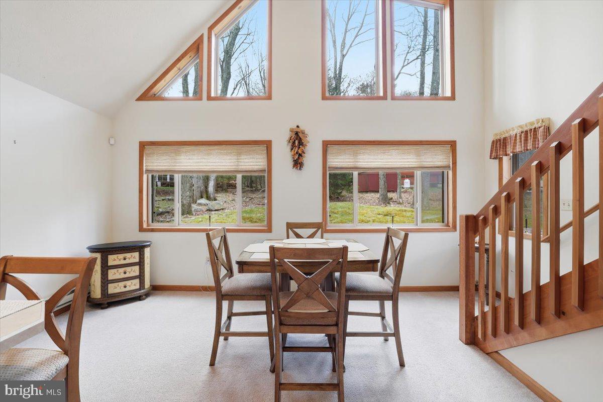 15 Hazard Run Road Lake Harmony, PA 18624 - Photo 25 of 46 a view of a dining room with furniture window and wooden floor