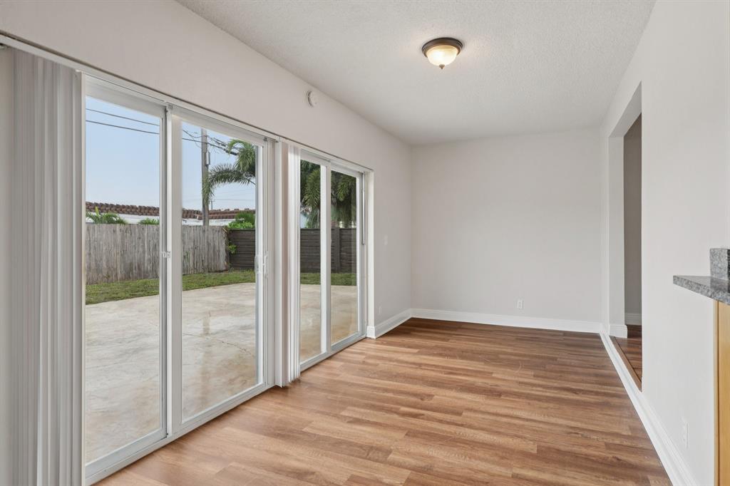 1541 Northwest 9th Street Boca Raton, FL 33486 - Photo 16 of 63 a view of empty room with wooden floor
