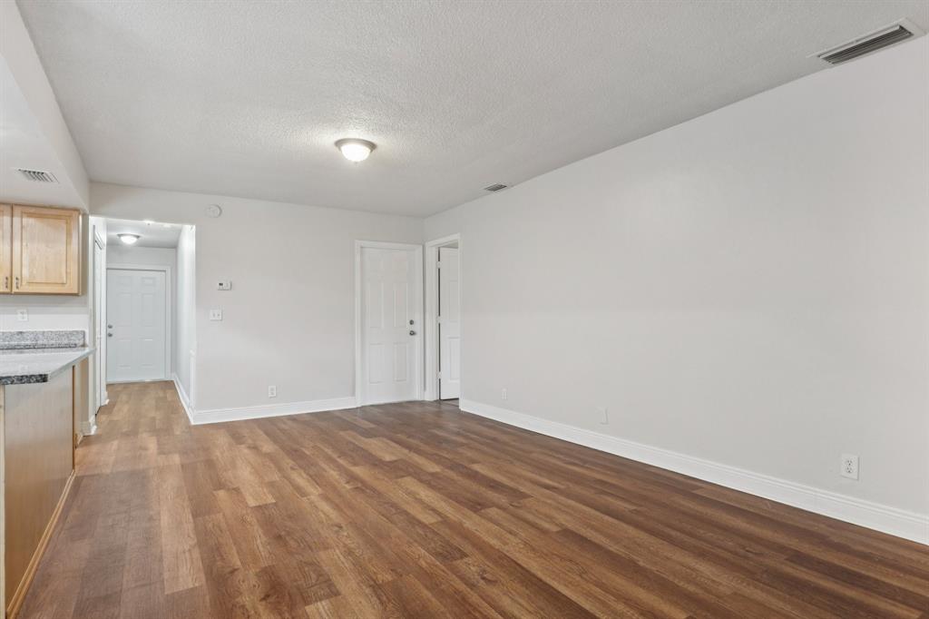 1541 Northwest 9th Street Boca Raton, FL 33486 - Photo 18 of 63 a view of empty room with wooden floor