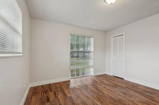 a bathroom with a toilet and a bathtub