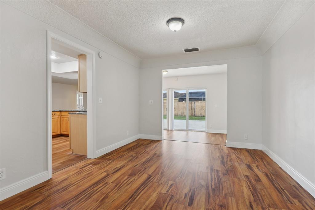 1541 Northwest 9th Street Boca Raton, FL 33486 - Photo 41 of 63 wooden floor in an empty room with a window