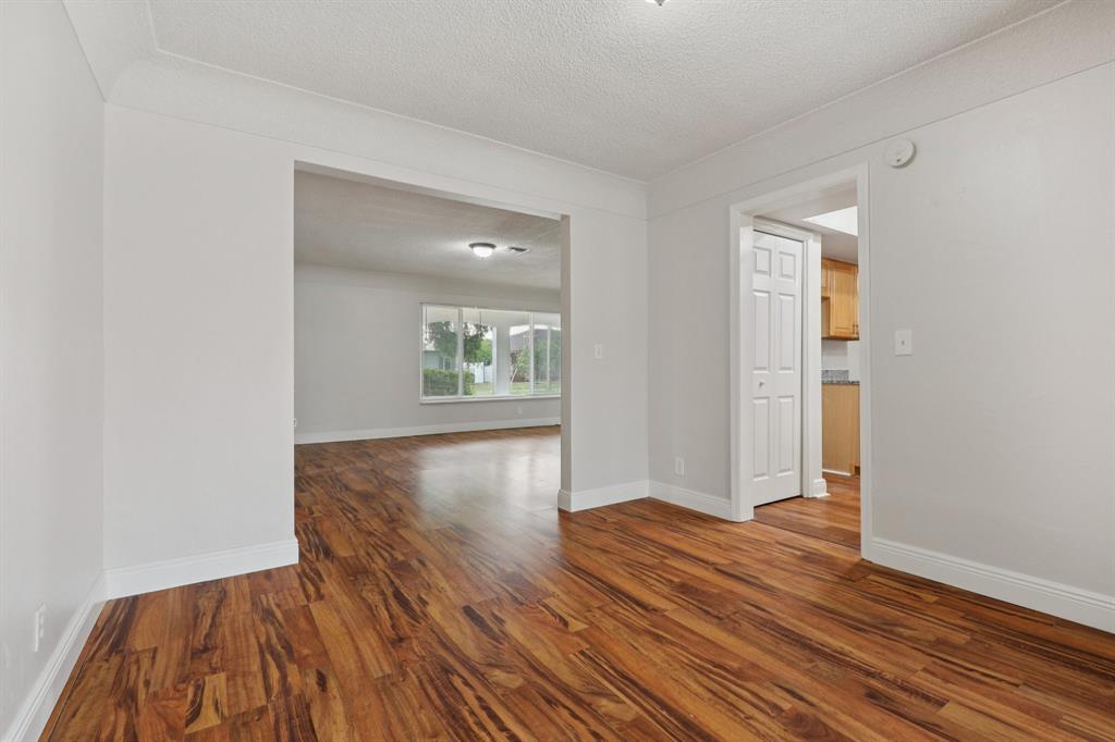 1541 Northwest 9th Street Boca Raton, FL 33486 - Photo 42 of 63 wooden floor in an empty room with a window