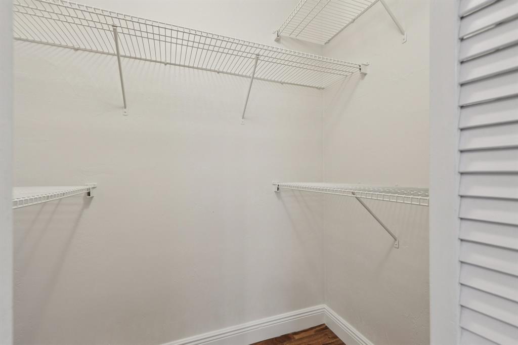 1541 Northwest 9th Street Boca Raton, FL 33486 - Photo 54 of 63 a view of a room with racks on the wall