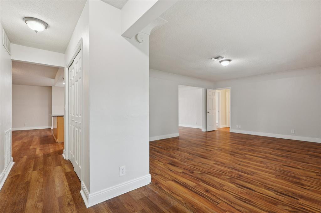 1541 Northwest 9th Street Boca Raton, FL 33486 - Photo 56 of 63 a view of a hallway with wooden floor