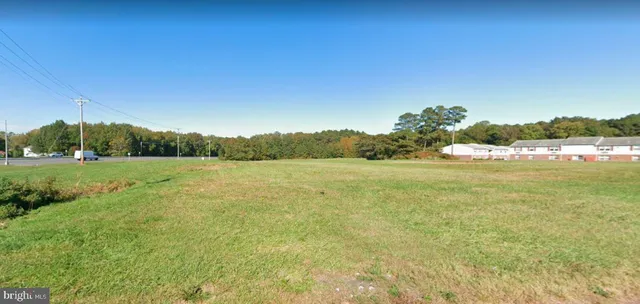 a view of a lake with a big yard