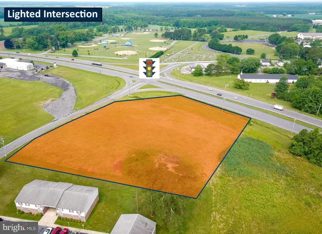 an aerial view of a swimming pool and outdoor space