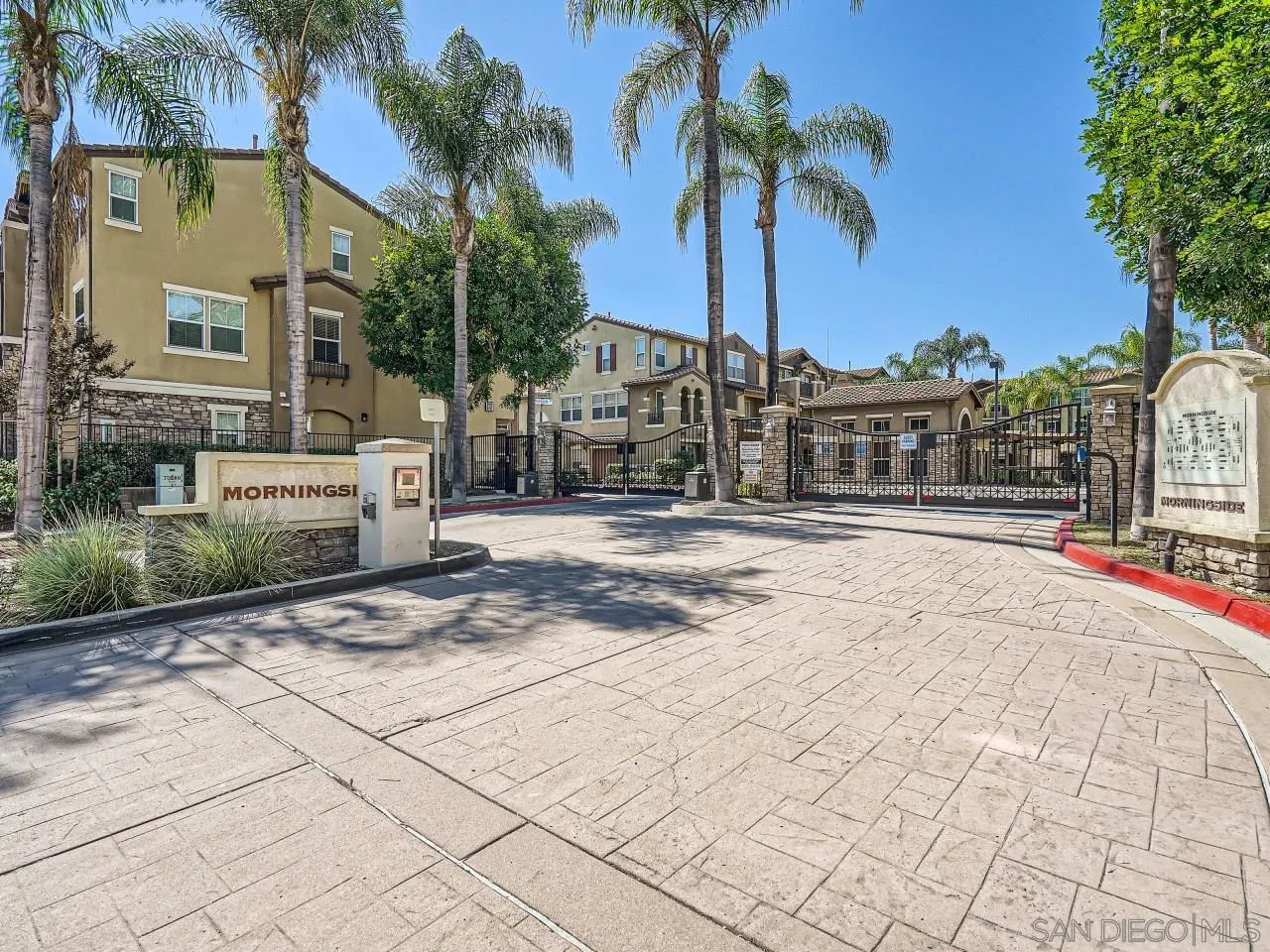 10225 Daybreak Lane, Unit 5 Santee, CA 92071 - Photo 2 of 27 a view of a house with a yard and palm trees