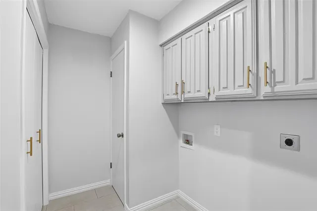 a view of cabinets and window