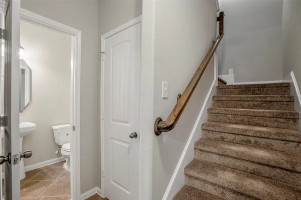 a view of a bathroom from the hallway