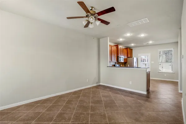 a view of an empty room and window