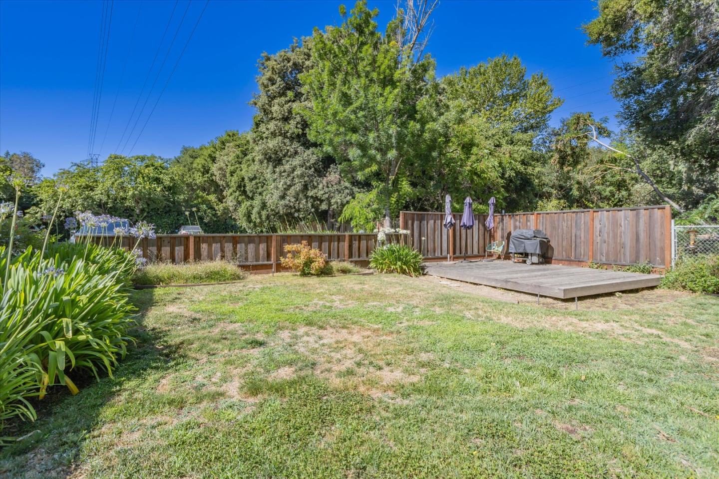 280 Easy Street, Unit 113 Mountain View, CA 94043 - Photo 22 of 22 a view of a garden with a bench