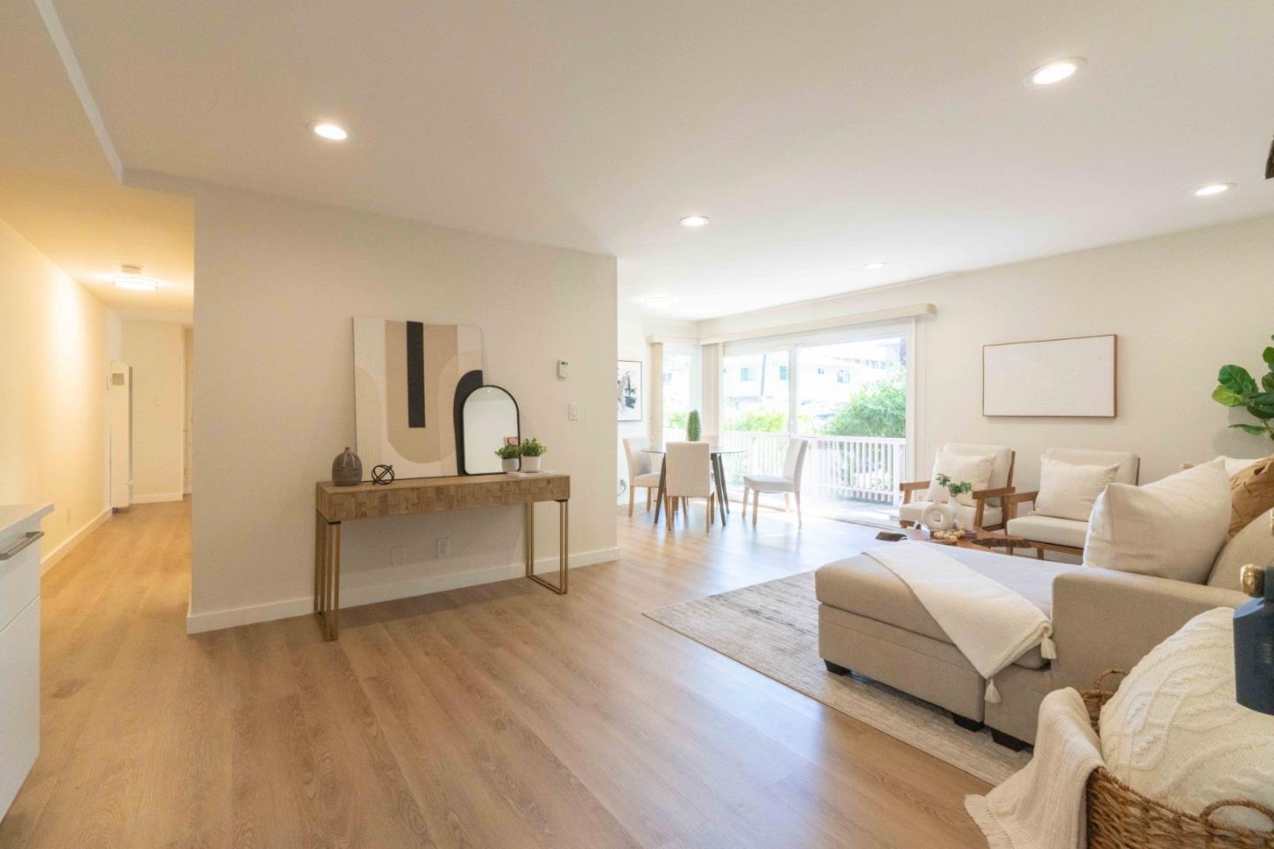 280 Easy Street, Unit 113 Mountain View, CA 94043 - Photo 4 of 22 a living room with furniture and a wooden floor