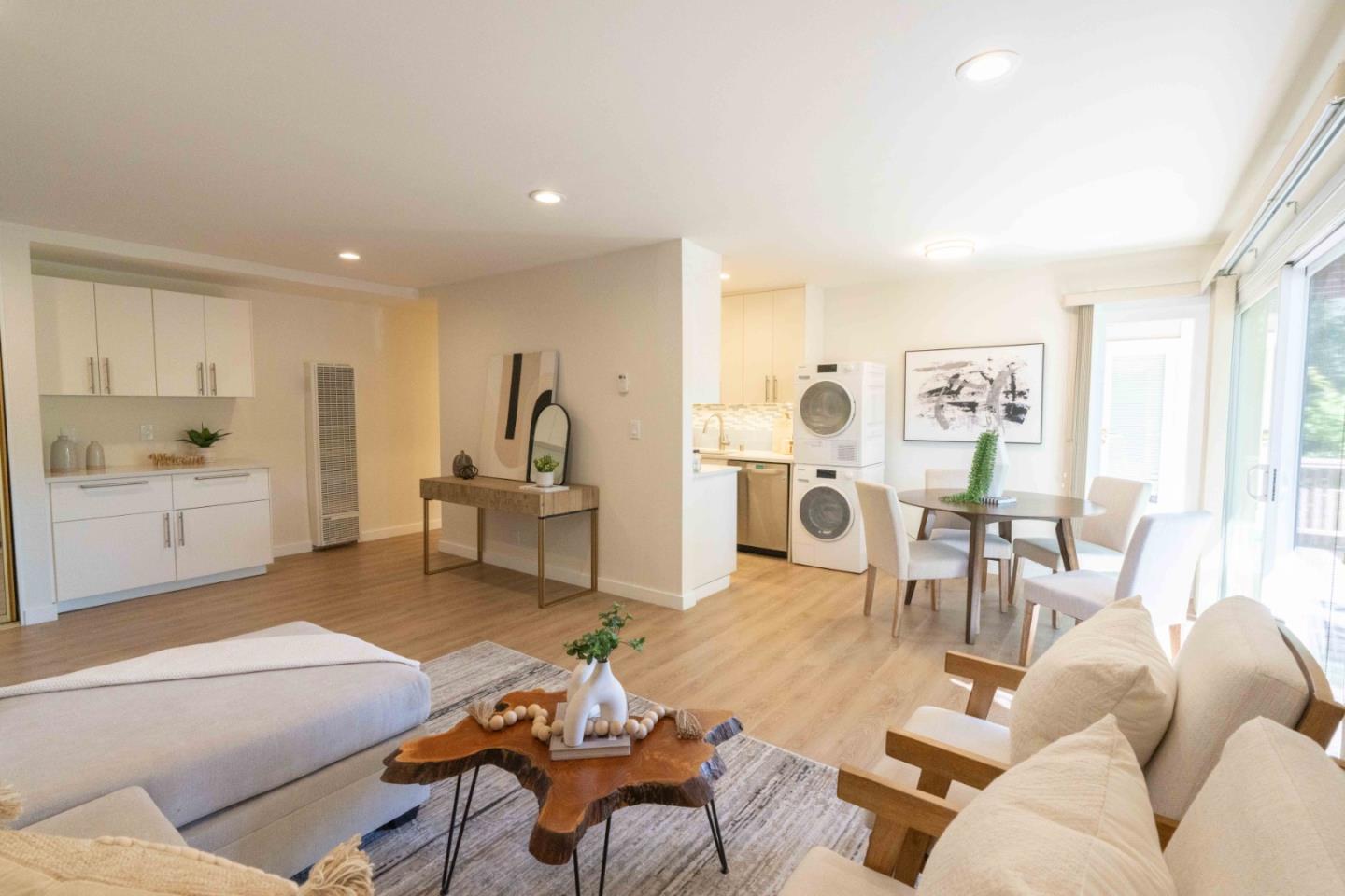 280 Easy Street, Unit 113 Mountain View, CA 94043 - Photo 5 of 22 a living room with furniture and a large window