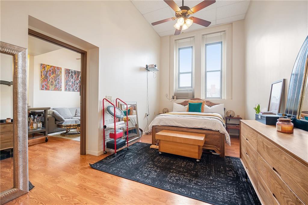 330 46th Street Pittsburgh, PA 15201 - Photo 11 of 25 a bedroom with a bed next to a window