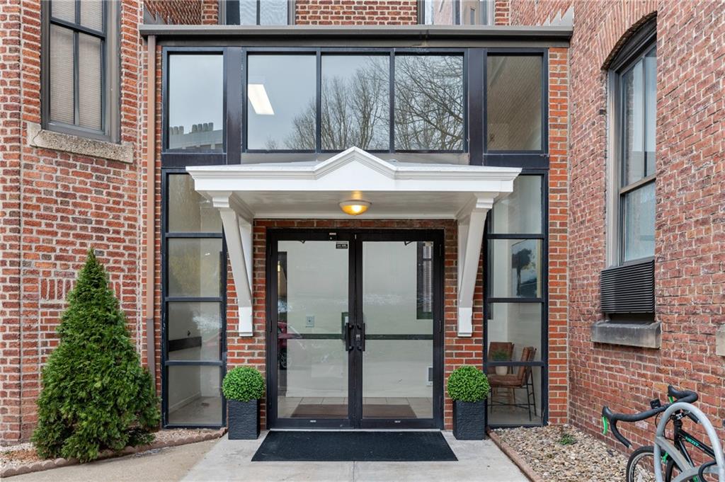 330 46th Street Pittsburgh, PA 15201 - Photo 4 of 25 a view of a brick house with a large window
