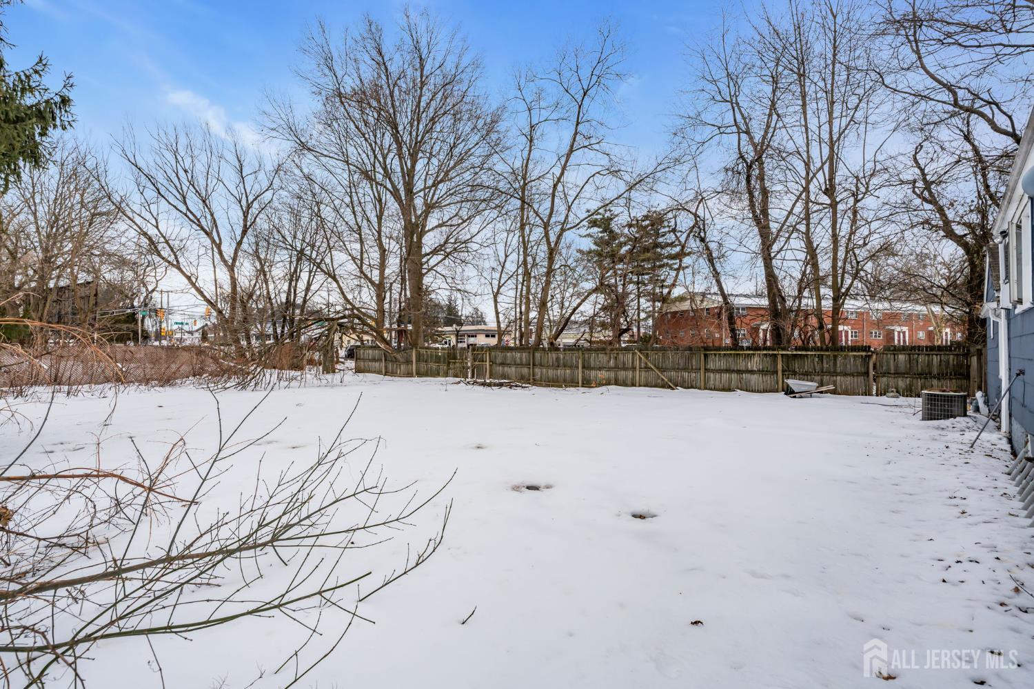 821 Front Street Dunellen, NJ 08812 - Photo 16 of 17 a view of yard covered with snow