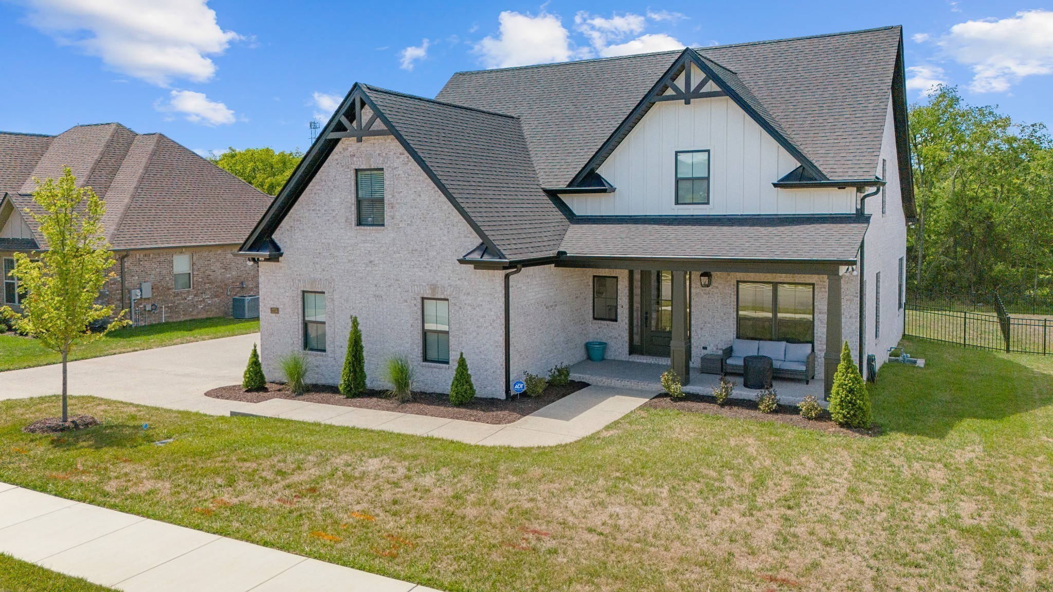 2774 Jasmine Street Lebanon, TN 37087 - Photo 1 of 47 a front view of a house with garden