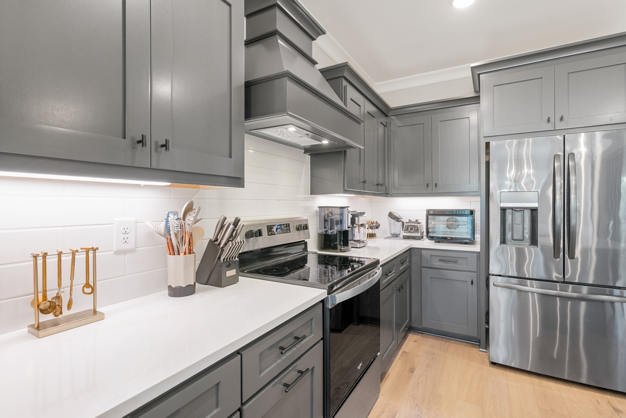 2774 Jasmine Street Lebanon, TN 37087 - Photo 14 of 47 a kitchen with cabinets and stainless steel appliances