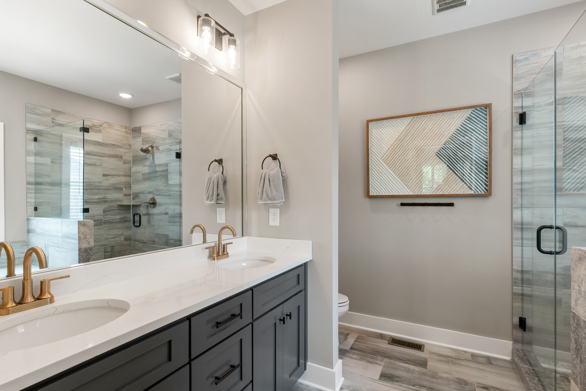 2774 Jasmine Street Lebanon, TN 37087 - Photo 22 of 47 a bathroom with a double vanity sink mirror and shower