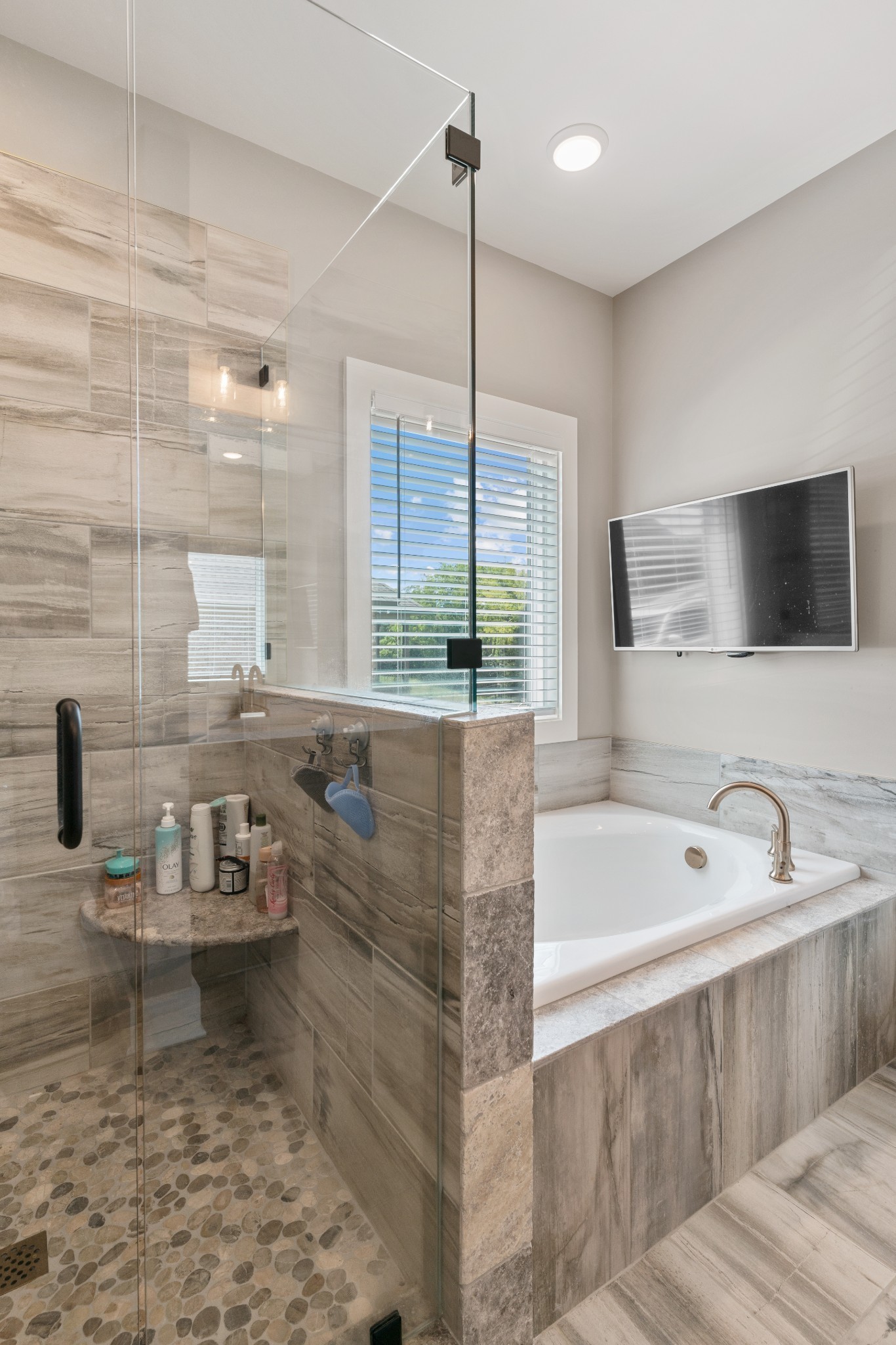 2774 Jasmine Street Lebanon, TN 37087 - Photo 23 of 47 a bathroom with a tub sink and mirror