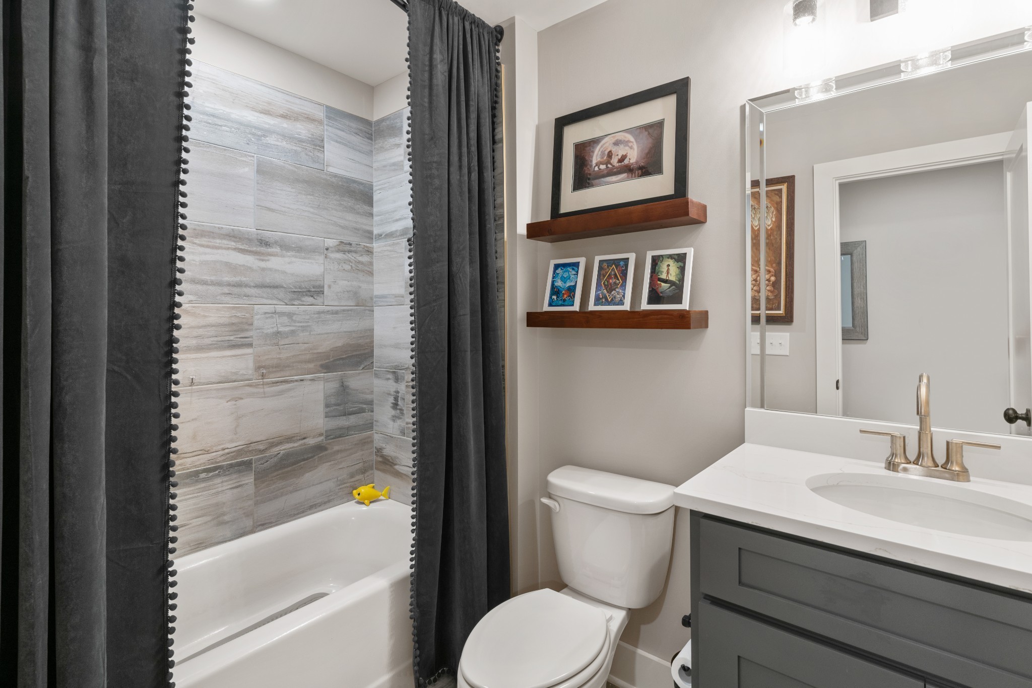 2774 Jasmine Street Lebanon, TN 37087 - Photo 31 of 47 a bathroom with a sink a mirror and a toilet