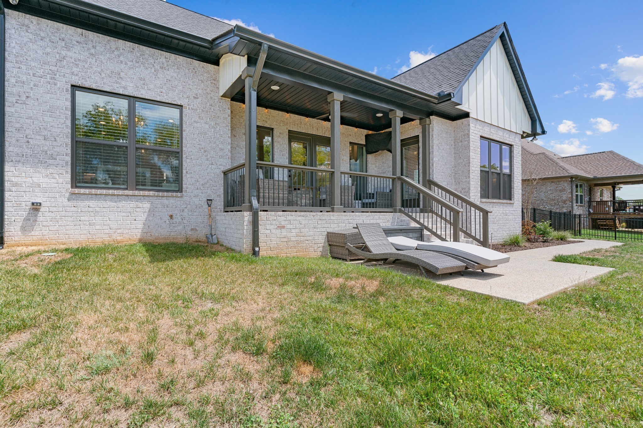 2774 Jasmine Street Lebanon, TN 37087 - Photo 41 of 47 a white house that has a big yard and a large tree