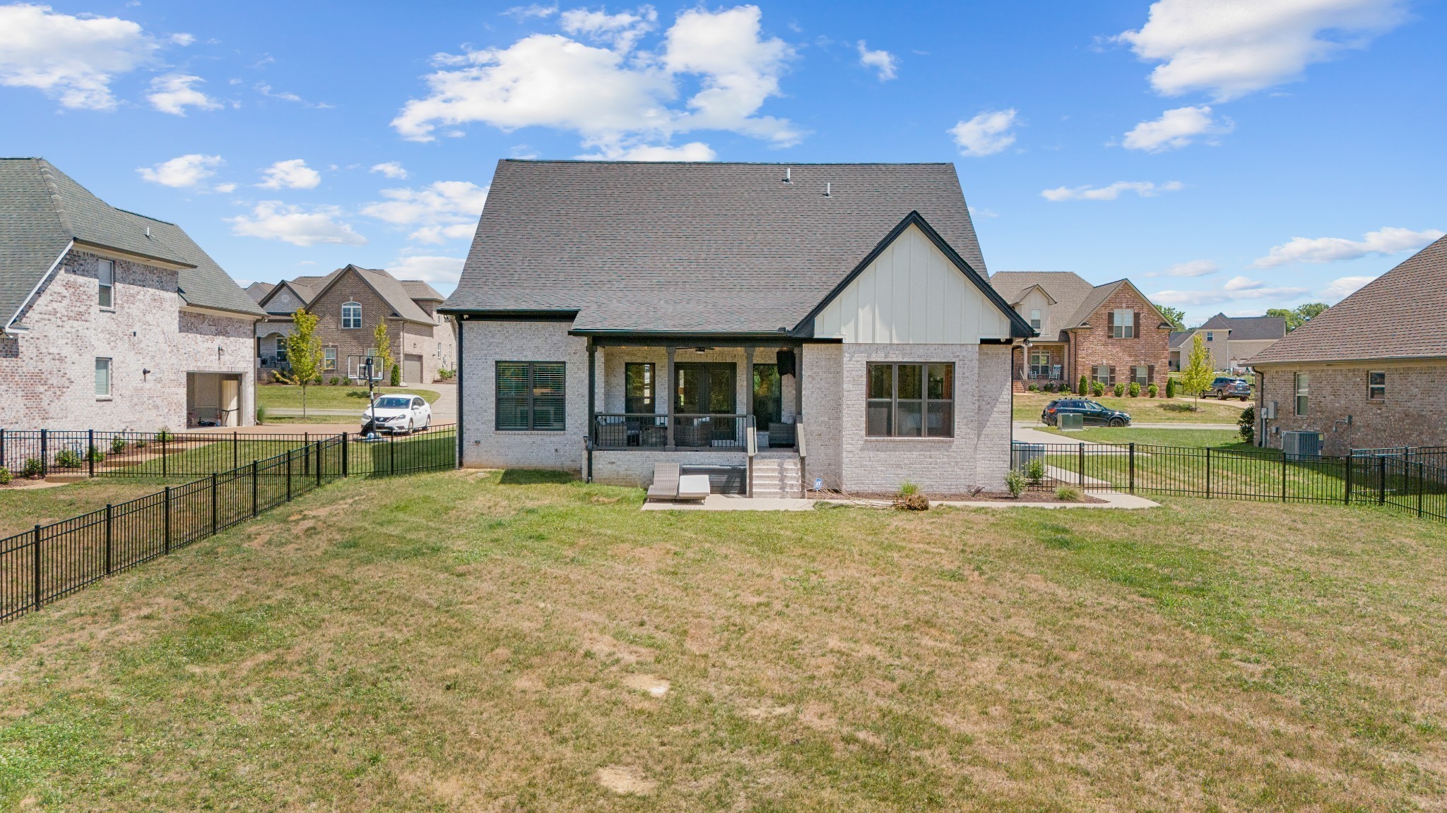 2774 Jasmine Street Lebanon, TN 37087 - Photo 43 of 47 a front view of a house with a garden and yard
