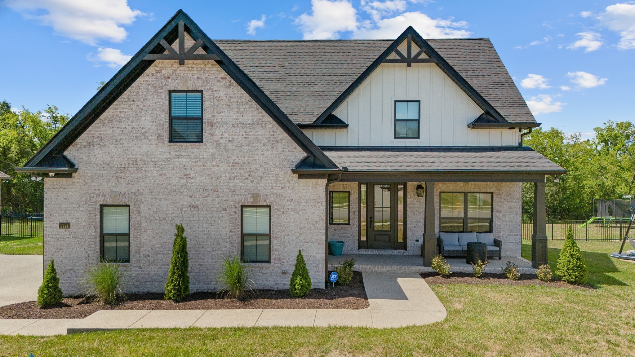 2774 Jasmine Street Lebanon, TN 37087 - Photo 47 of 47 a front view of a house with garden