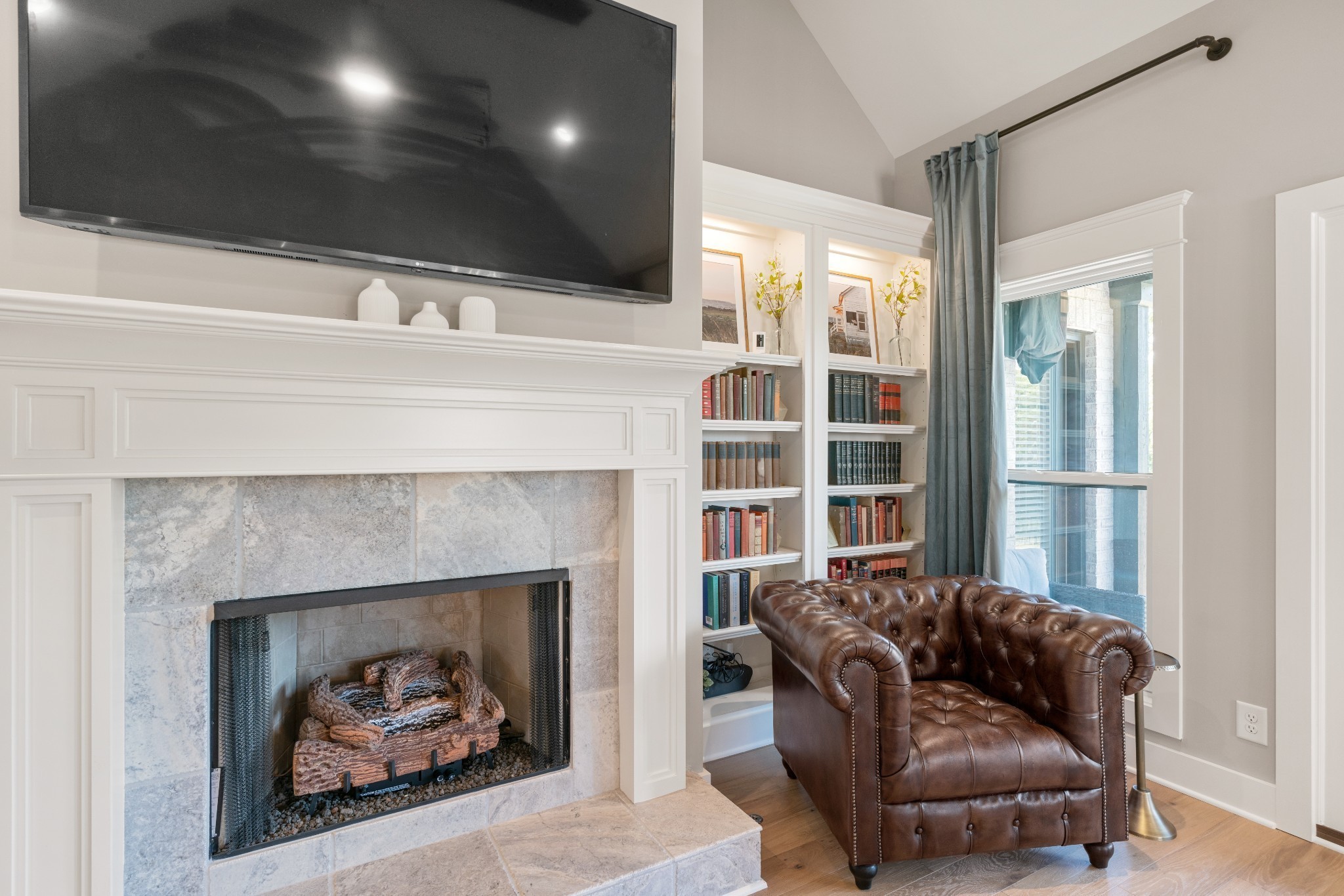 2774 Jasmine Street Lebanon, TN 37087 - Photo 8 of 47 a living room with furniture and a fireplace