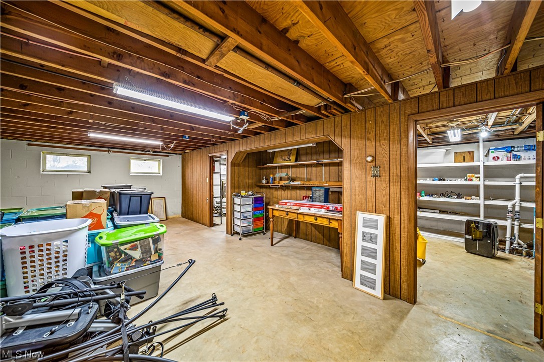 1305 Garrison Road Ashtabula, OH 44004 - Photo 33 of 46 Basement with a workshop area