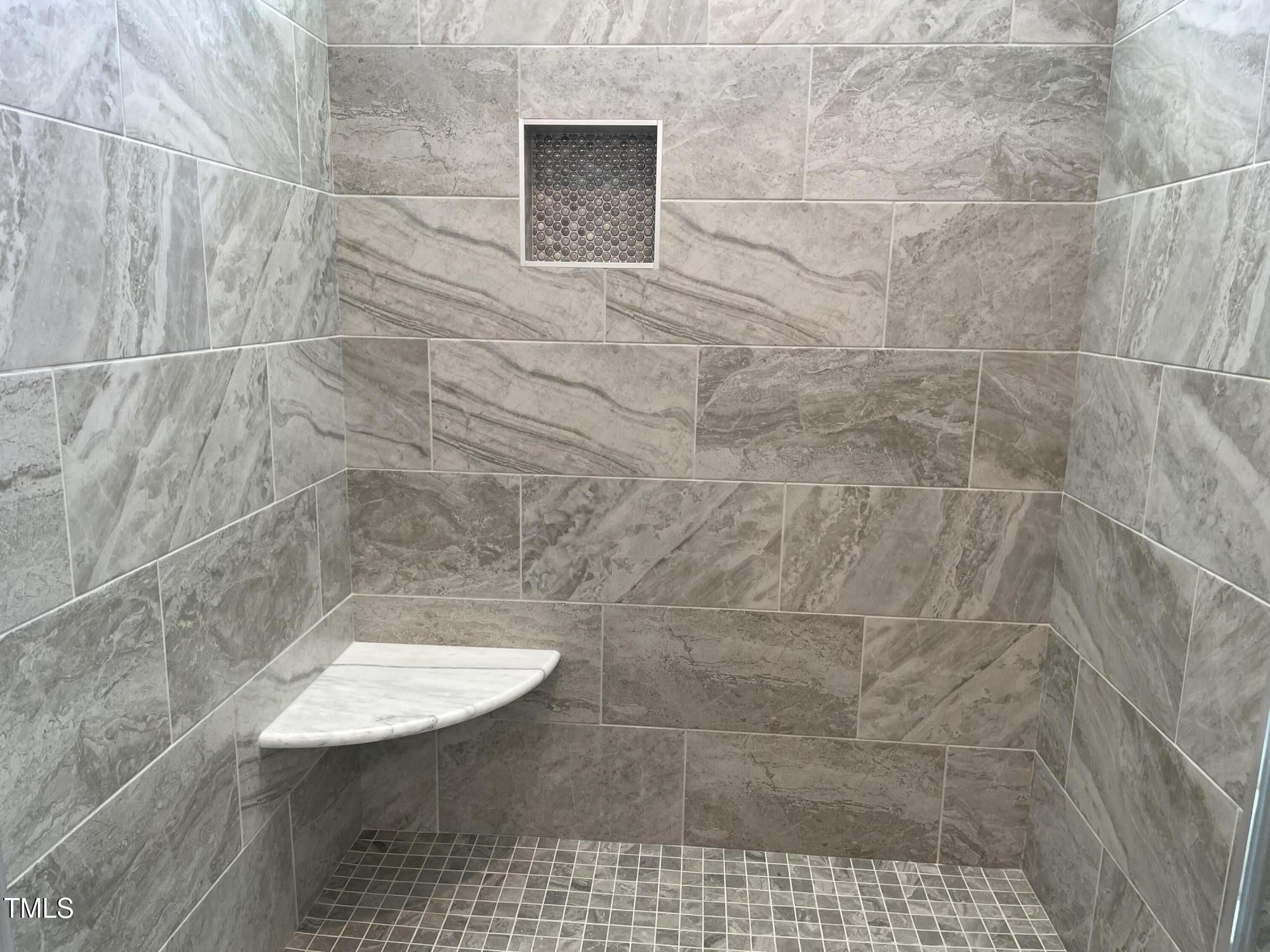 85 Old Gdn Lane Youngsville, NC 27596 - Photo 12 of 17 a bathroom with a shower