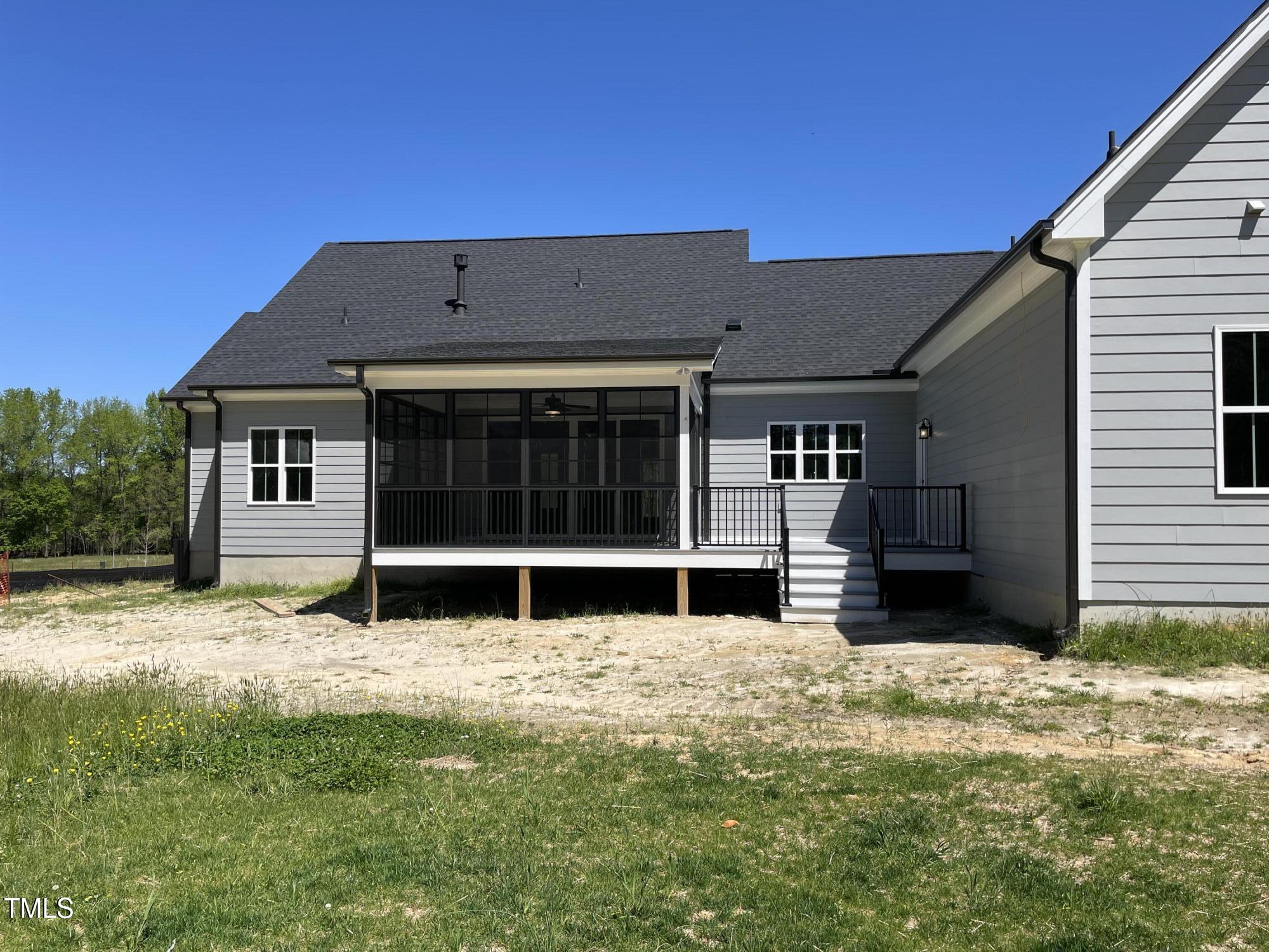 85 Old Gdn Lane Youngsville, NC 27596 - Photo 15 of 17 a house with trees in the background